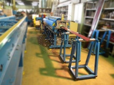Eave trim roll forming machine