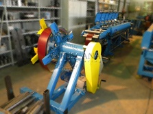 Eave trim roll forming machine